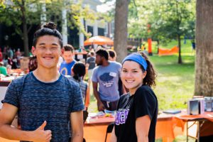 Students smiling at K Fest Student Involvement Fair