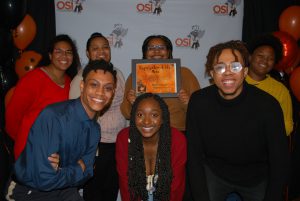 Black Student Organization gather for a group picture with their award: Organization of the Year at Black and Orange Awards 2019
